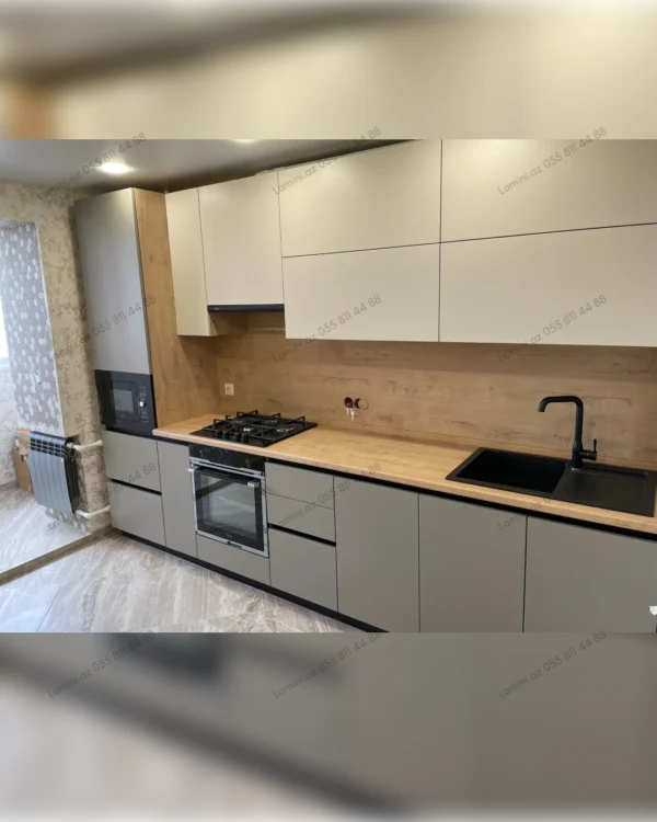 Modern kitchen with wooden accents.