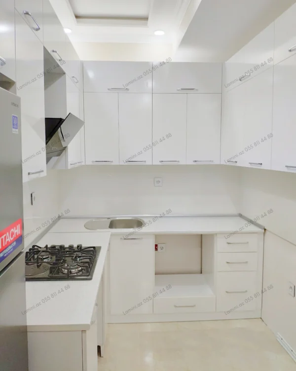 Modern white kitchen with appliances