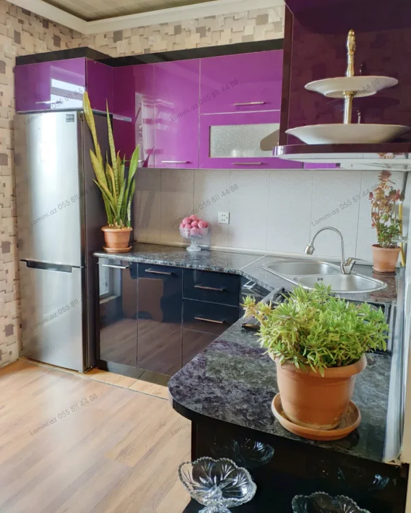 Modern kitchen with purple cabinets.
